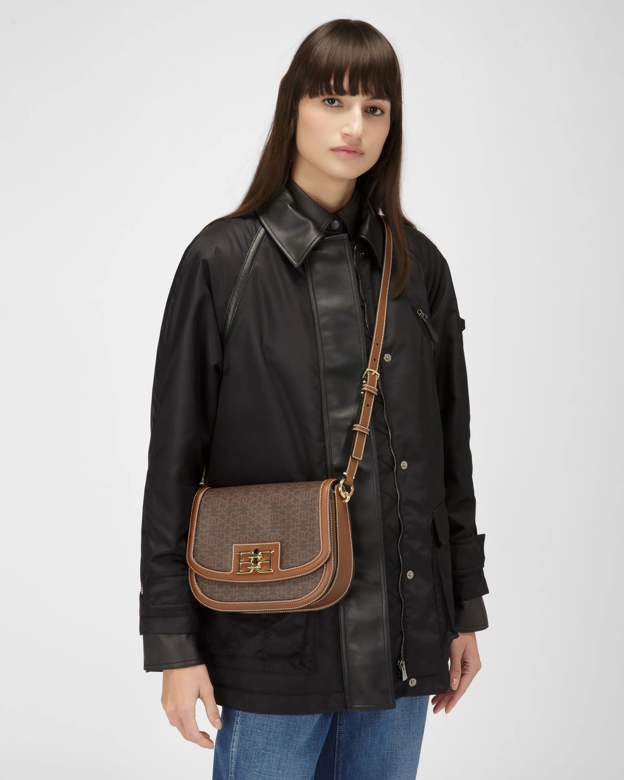 Beckie Tpu Crossbody Bag In Brown