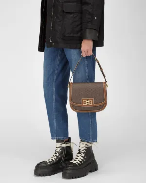Beckie Tpu Crossbody Bag In Brown