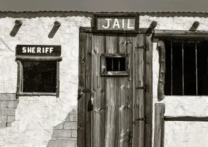 BELECO Fabric 8x6ft Western Jail and Sheriff's Office Backdrop Old West Ghost Town Prison Sheriff Window Police Jail Background Wild West Theme Halloween Jail Party Decorations Portrait Photo Props
