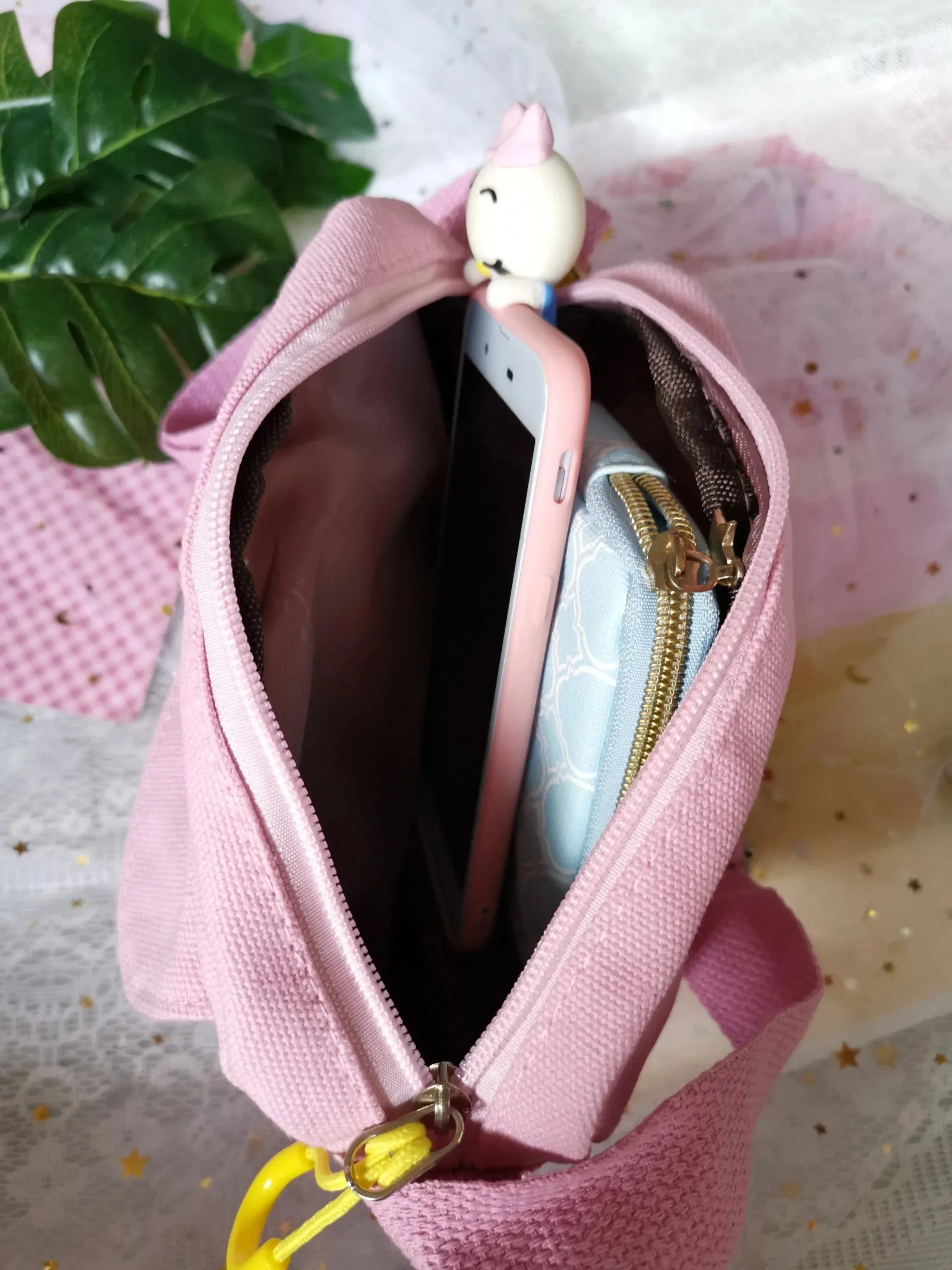 Sling bag with clear compartment