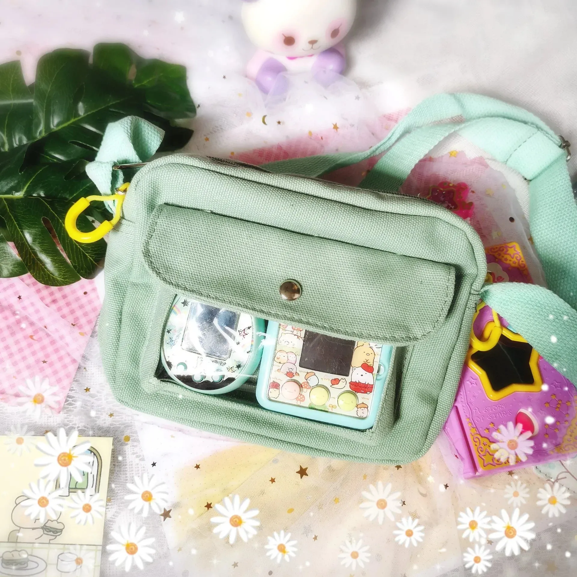 Sling bag with clear compartment