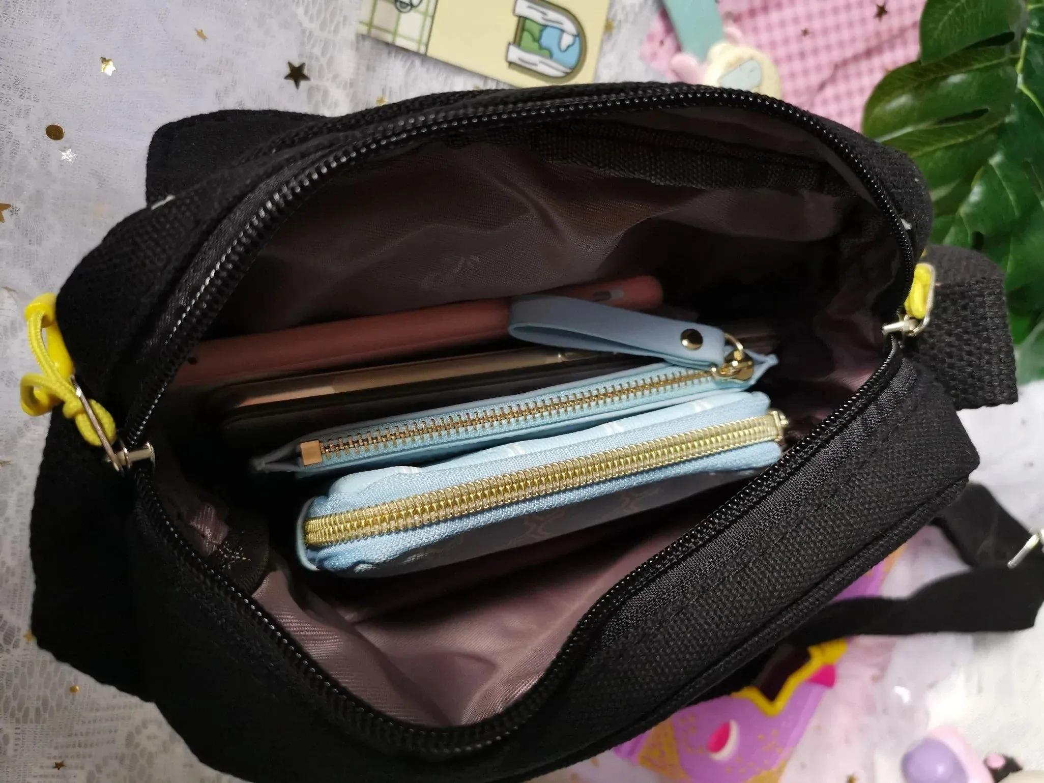 Sling bag with clear compartment