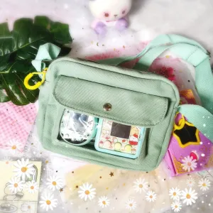 Sling bag with clear compartment